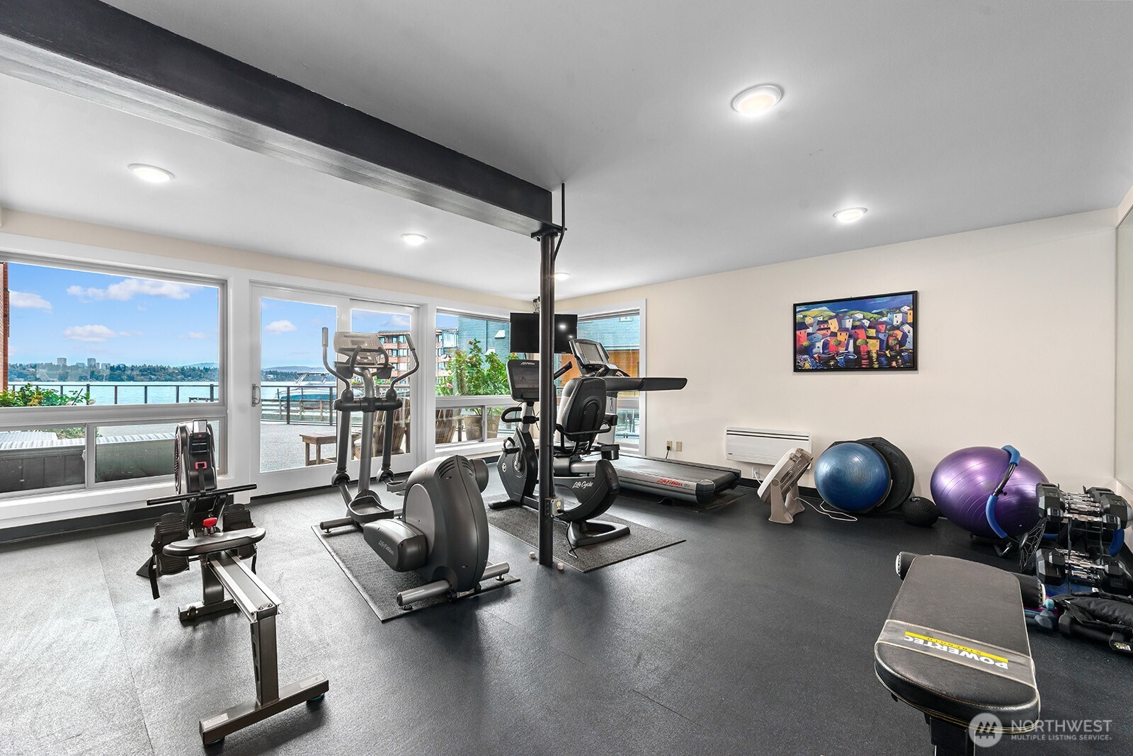 2360 43rd Avenue East, Unit 214 Seattle, WA 98112 - Photo 32 of 34 a view of a room with gym equipment
