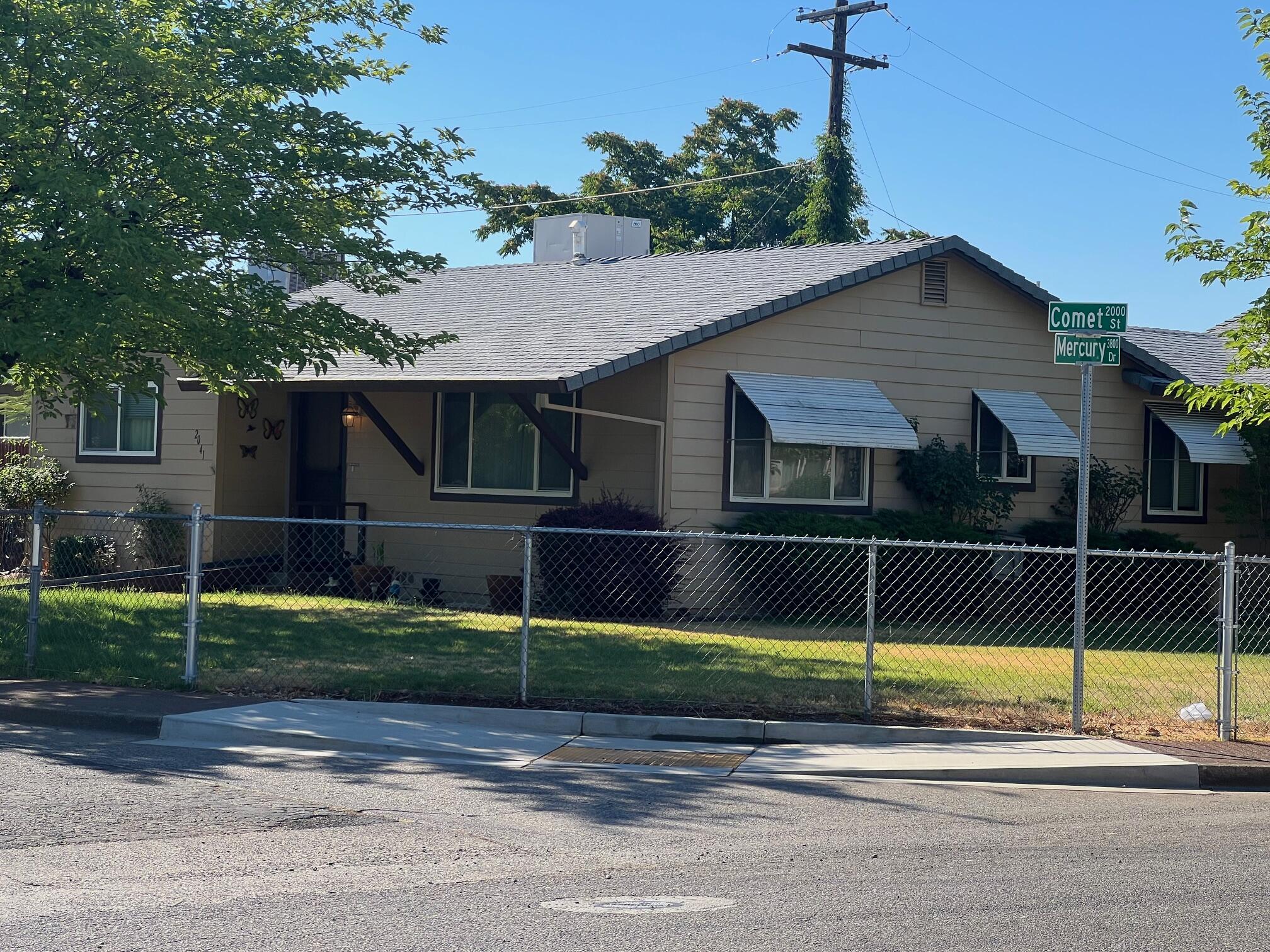 2041 Comet Street Redding, CA 96002 - Photo 11 of 16 a backyard of a house