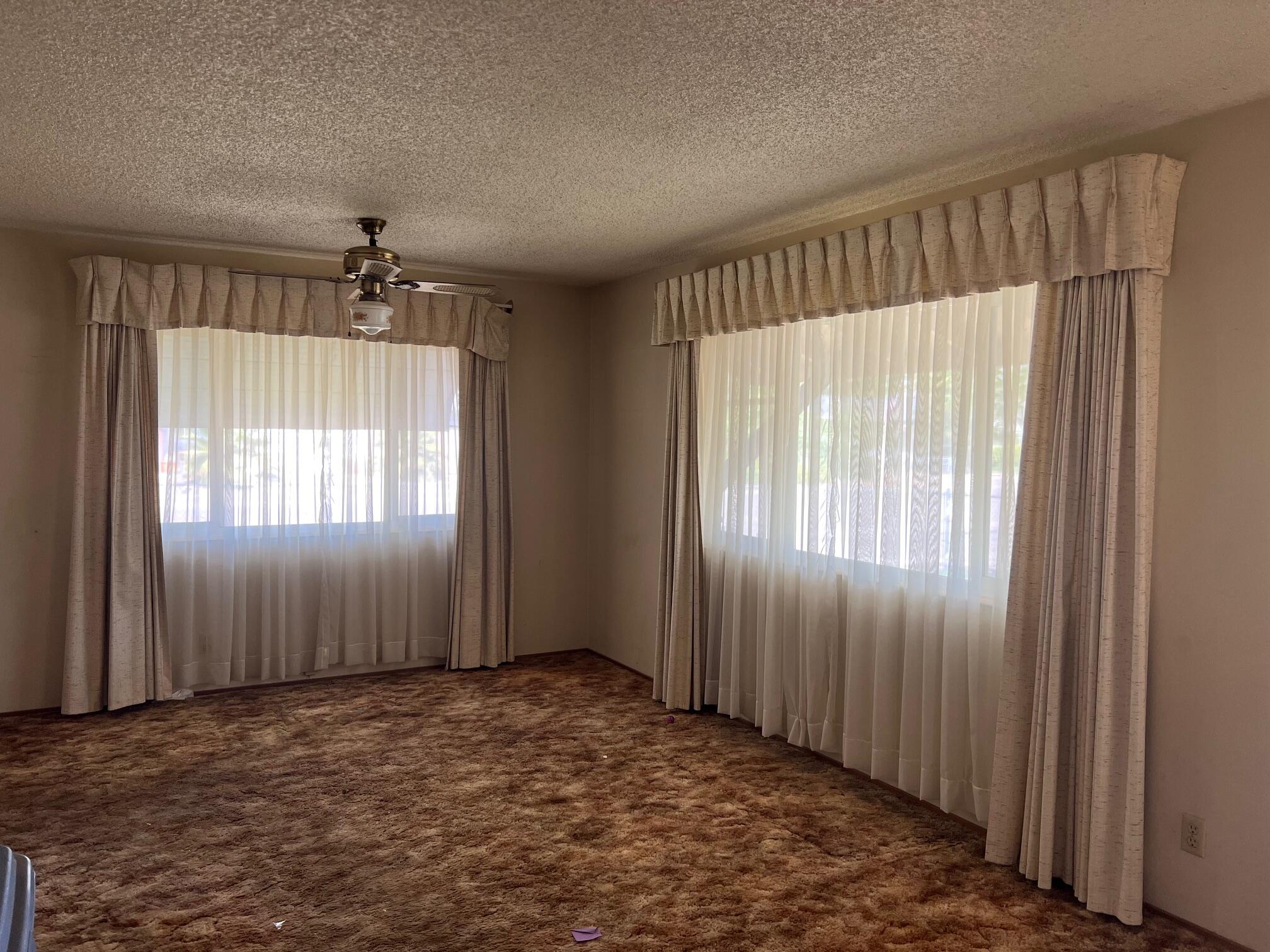 2041 Comet Street Redding, CA 96002 - Photo 3 of 16 an empty room with windows and closet