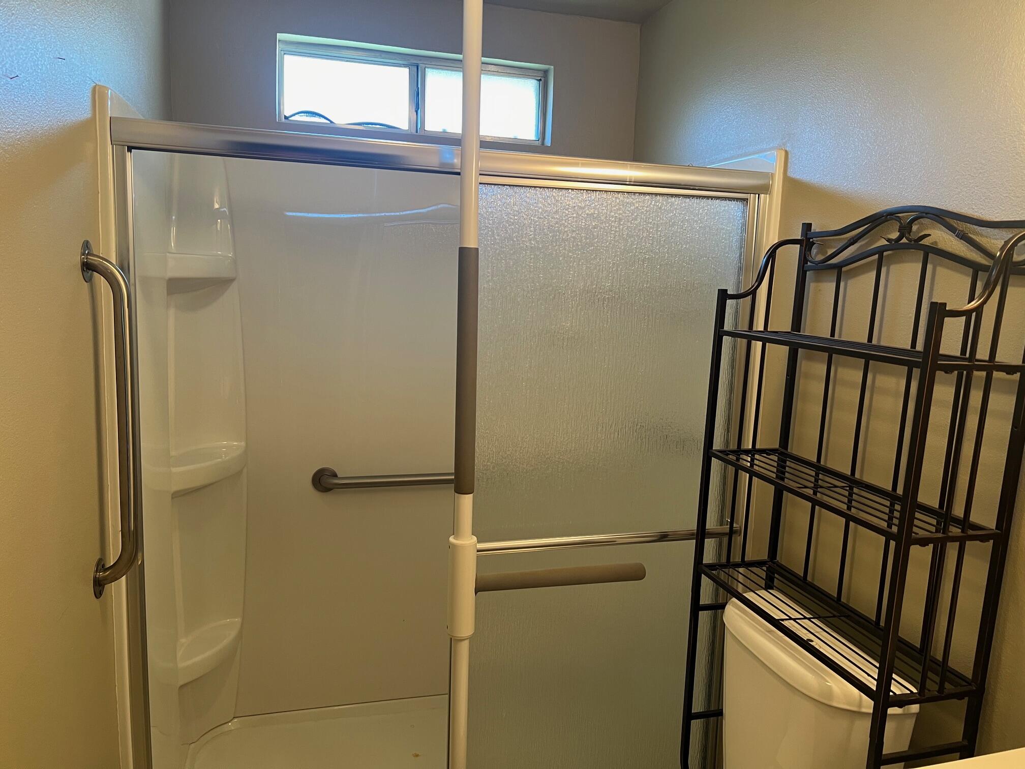 2041 Comet Street Redding, CA 96002 - Photo 4 of 16 a bathroom with a shower