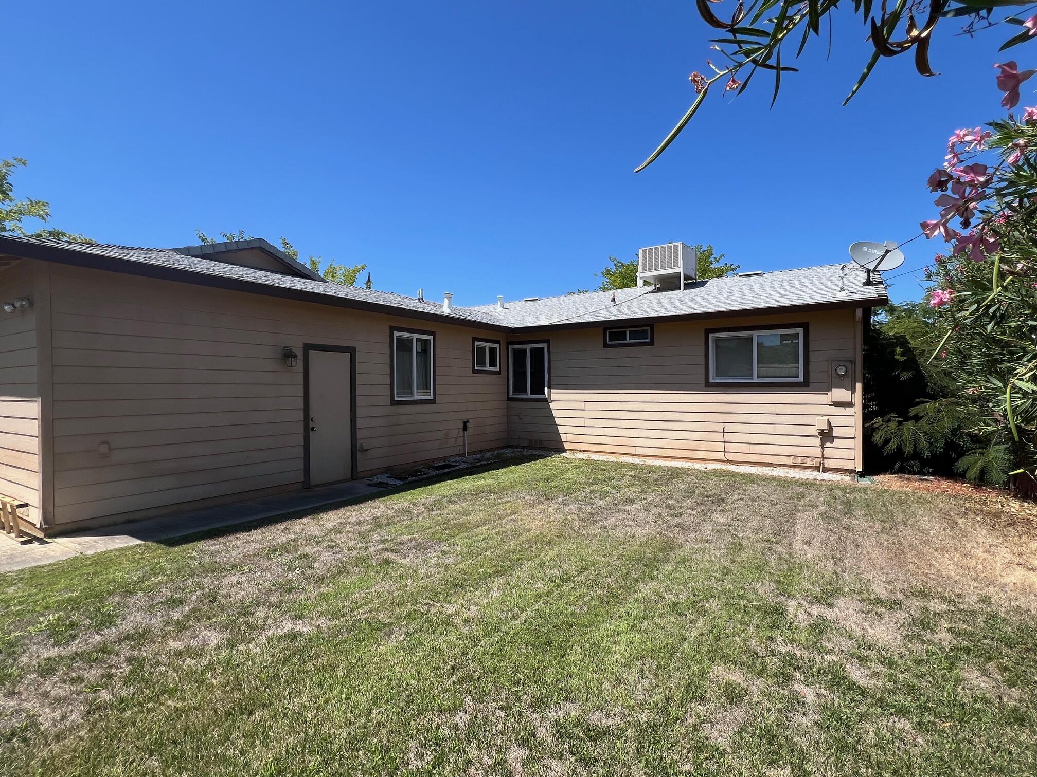 2041 Comet Street Redding, CA 96002 - Photo 5 of 16 a house view with a backyard space