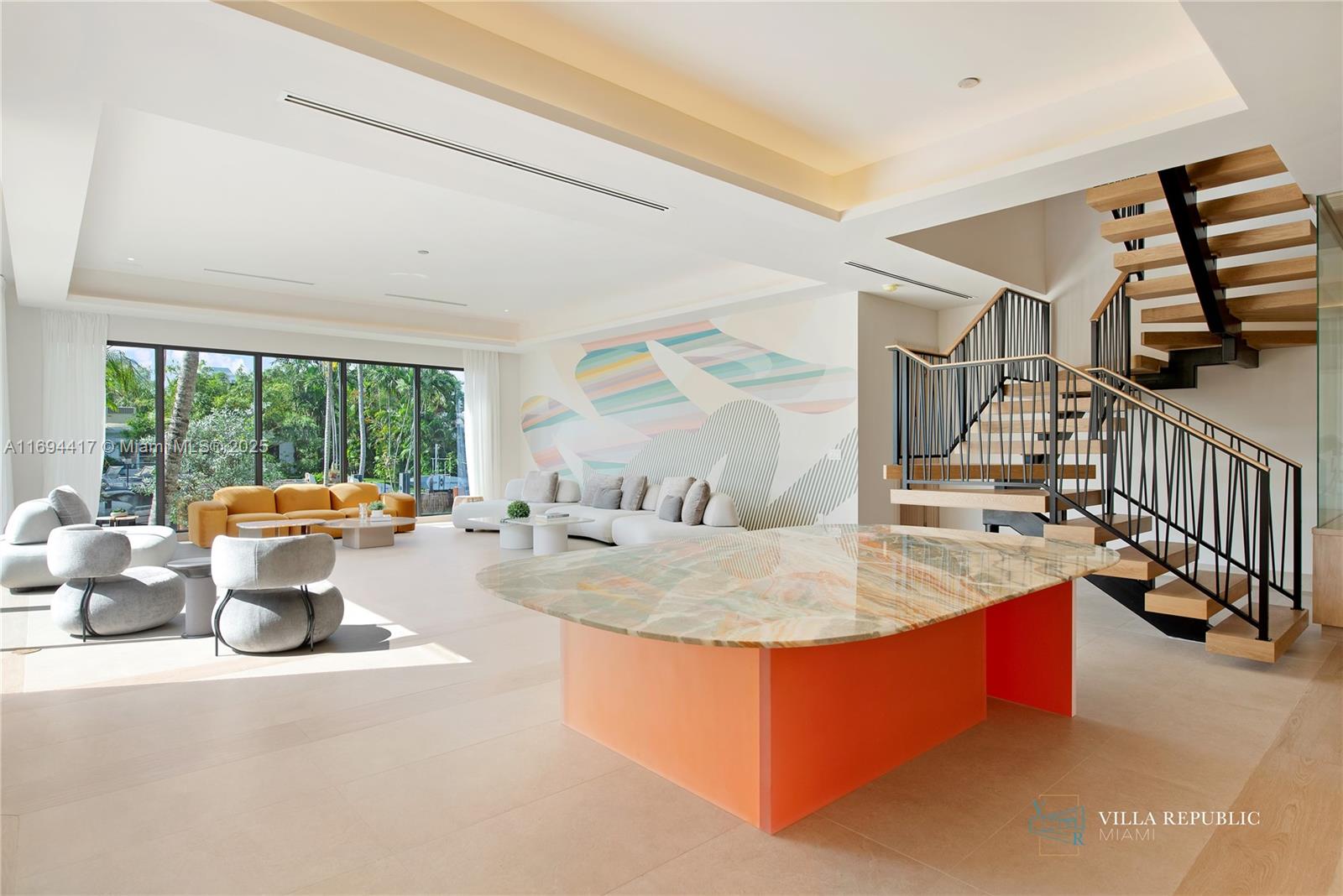 1200 Northeast 87th Street Miami, FL 33138 - Photo 16 of 58 a view of living room with furniture and flat screen tv