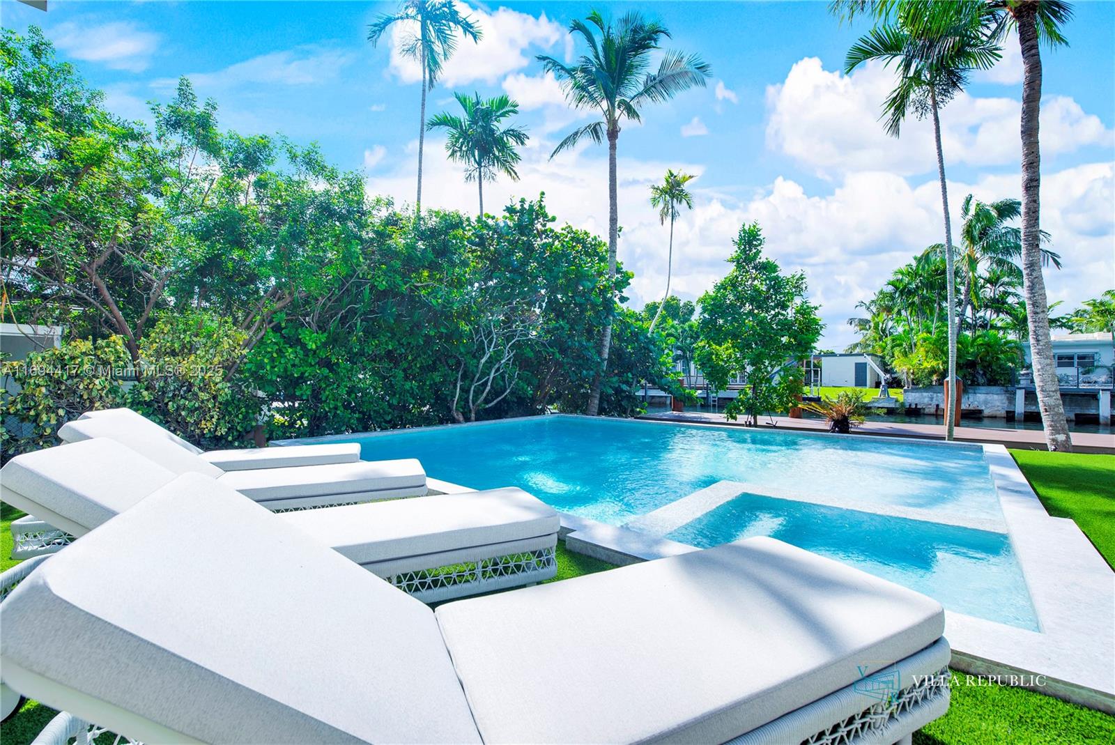 1200 Northeast 87th Street Miami, FL 33138 - Photo 22 of 58 a view of a backyard with swimming pool