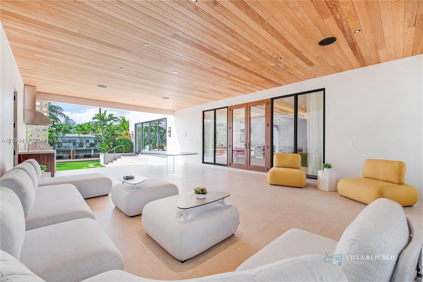 1200 Northeast 87th Street Miami, FL 33138 - Photo 3 of 58 a living room with furniture and a large window