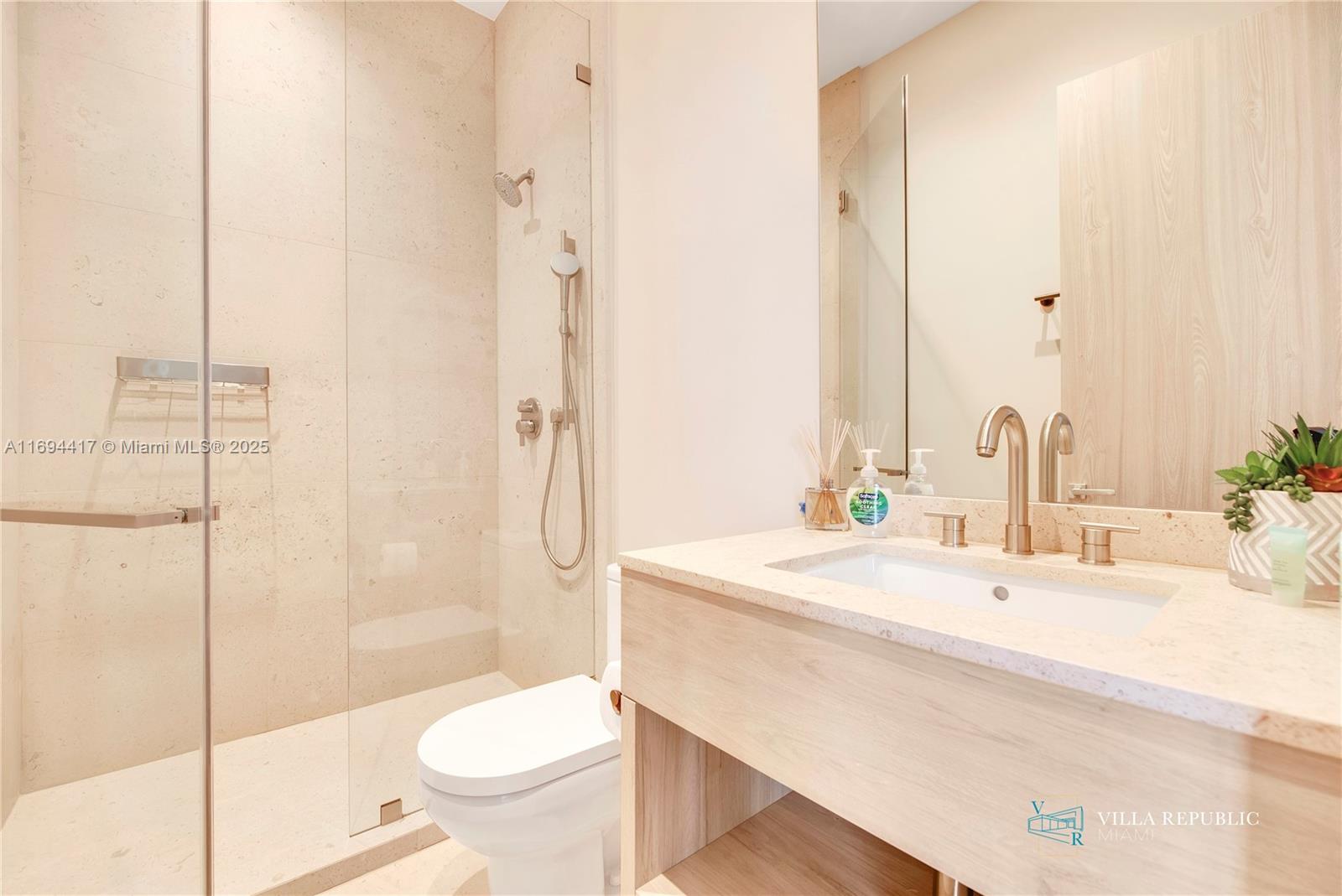 1200 Northeast 87th Street Miami, FL 33138 - Photo 35 of 58 a bathroom with a sink toilet and shower