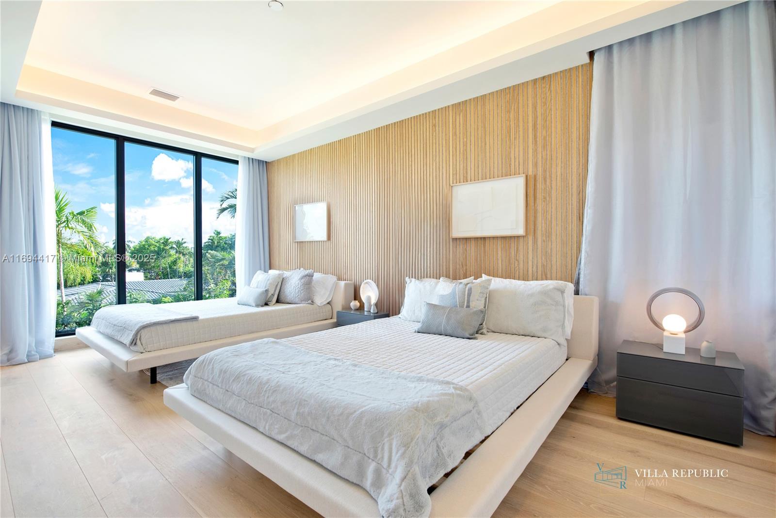 1200 Northeast 87th Street Miami, FL 33138 - Photo 42 of 58 a bedroom with a bed window and potted plant