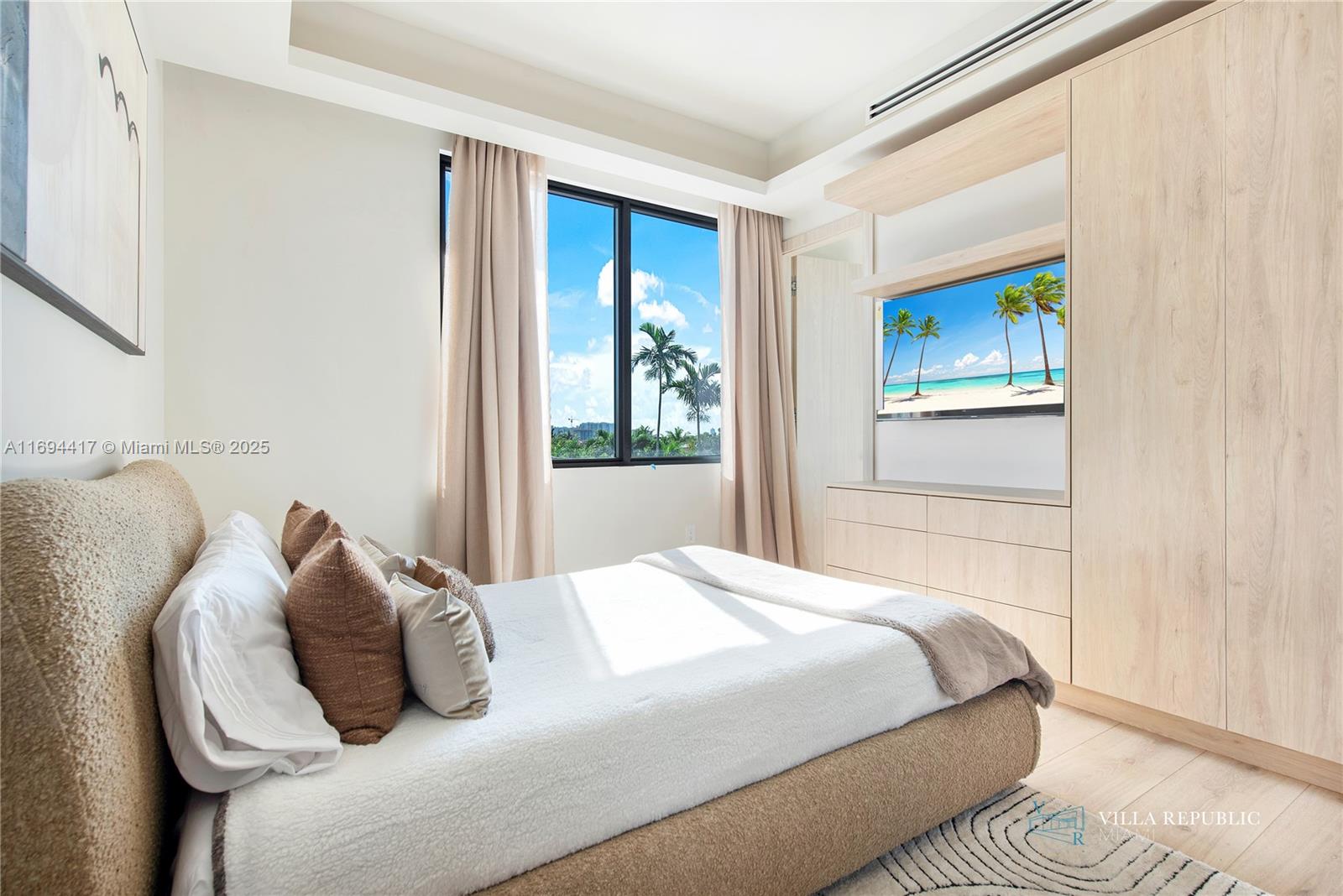 1200 Northeast 87th Street Miami, FL 33138 - Photo 48 of 58 a bedroom with a bed and a window