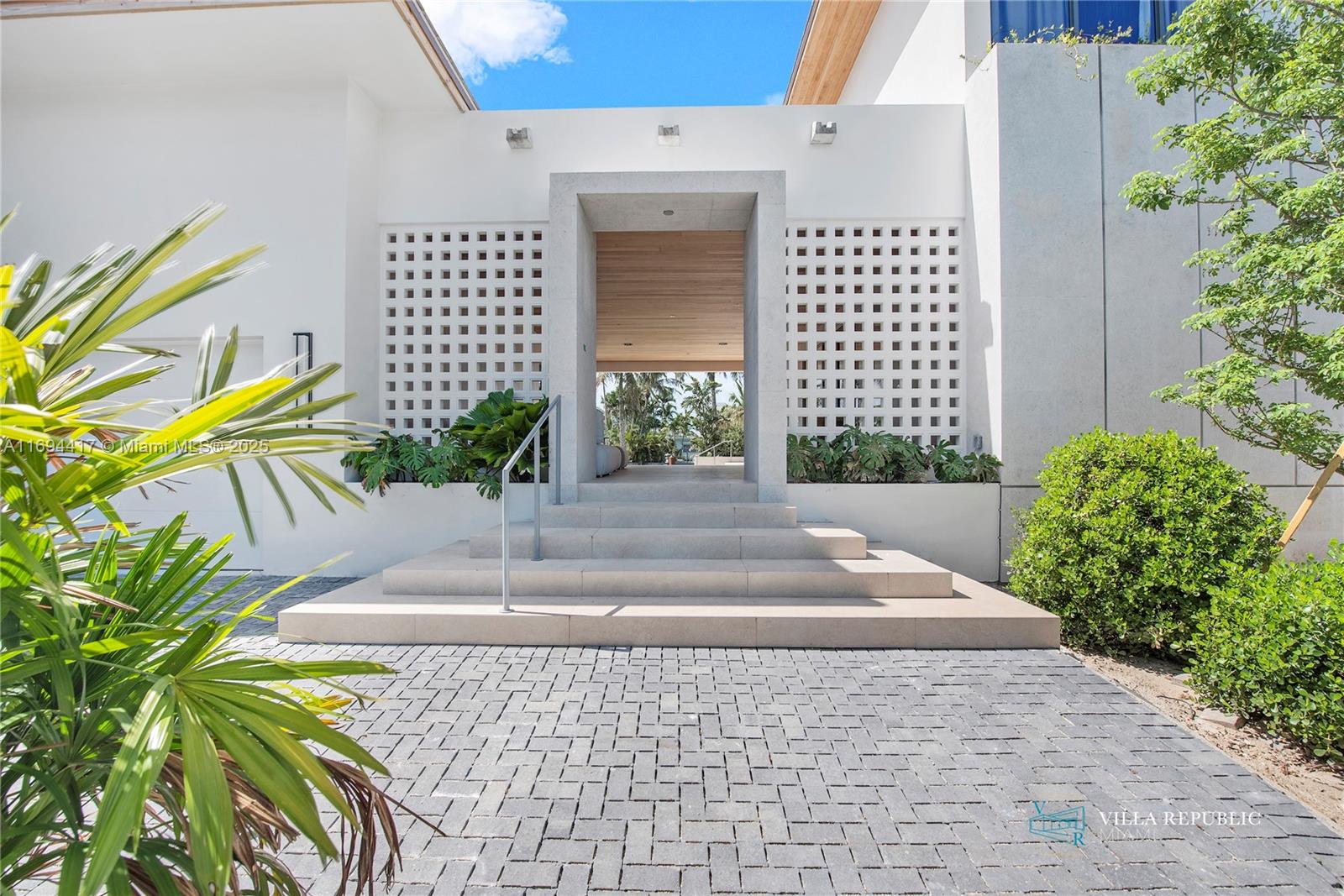 1200 Northeast 87th Street Miami, FL 33138 - Photo 5 of 58 a front view of a house with a yard