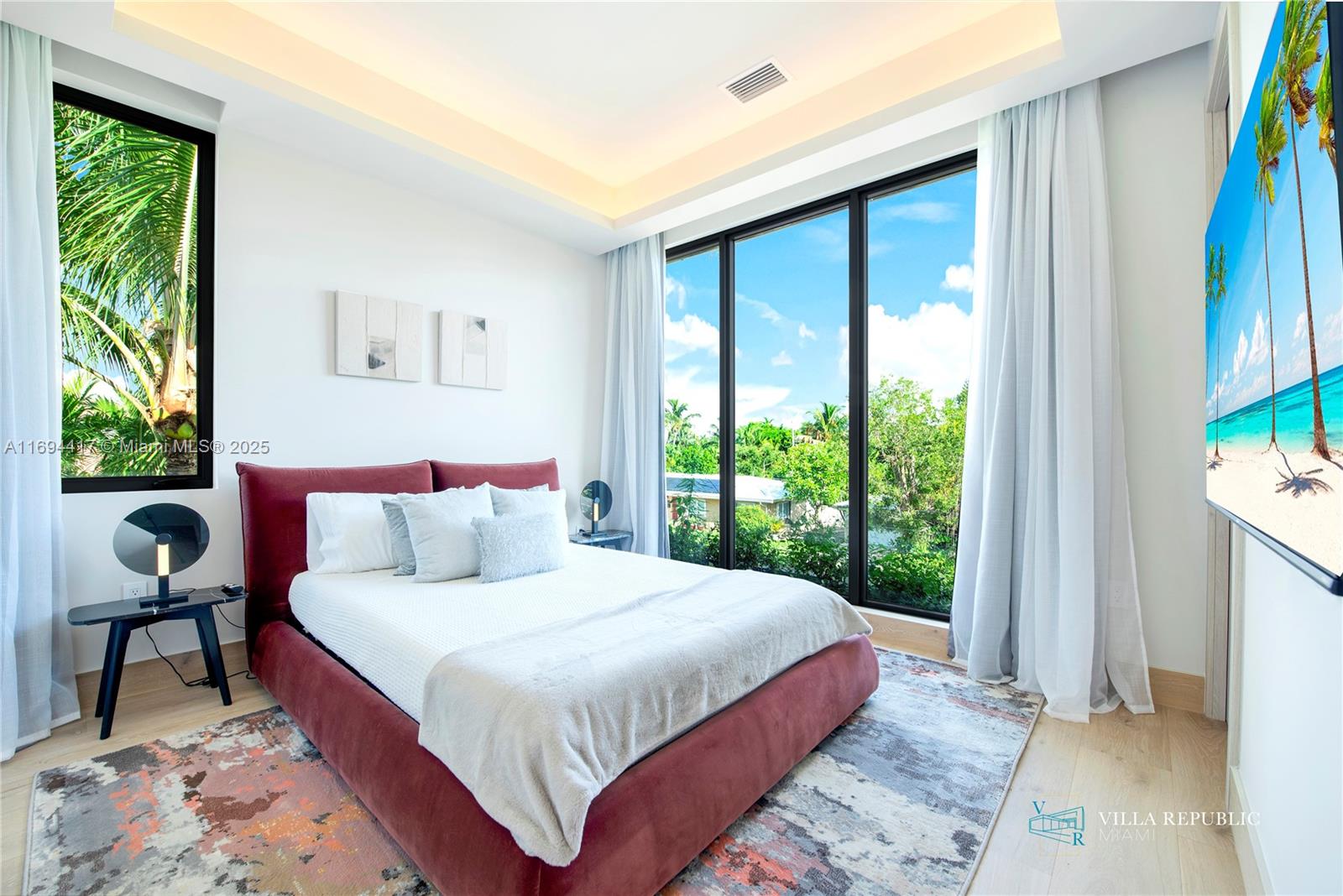 1200 Northeast 87th Street Miami, FL 33138 - Photo 53 of 58 a bedroom with a bed and a window