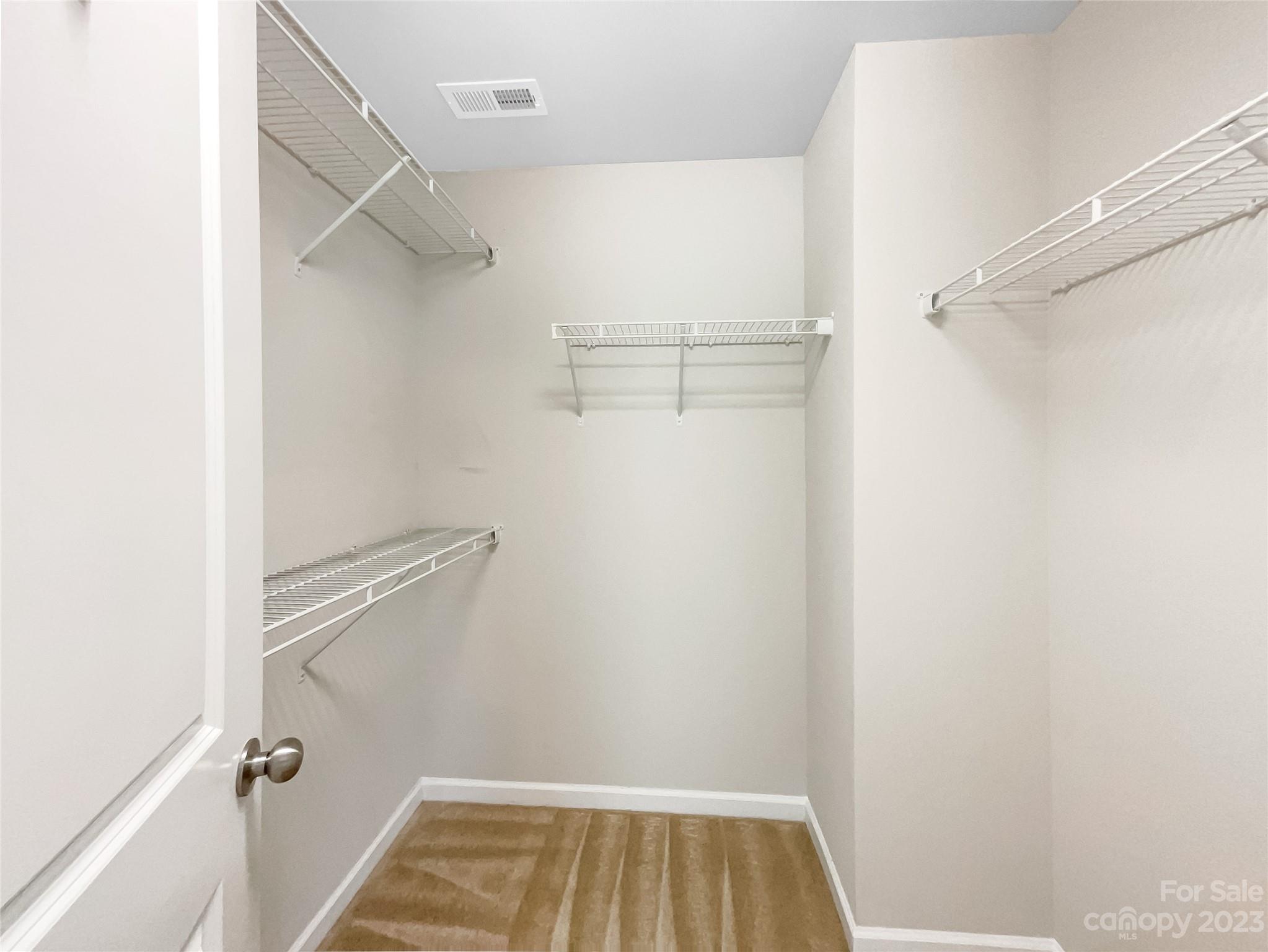 1004 Archibald Avenue Fort Mill, SC 29708 - Photo 12 of 18 a view of a room with racks on the wall