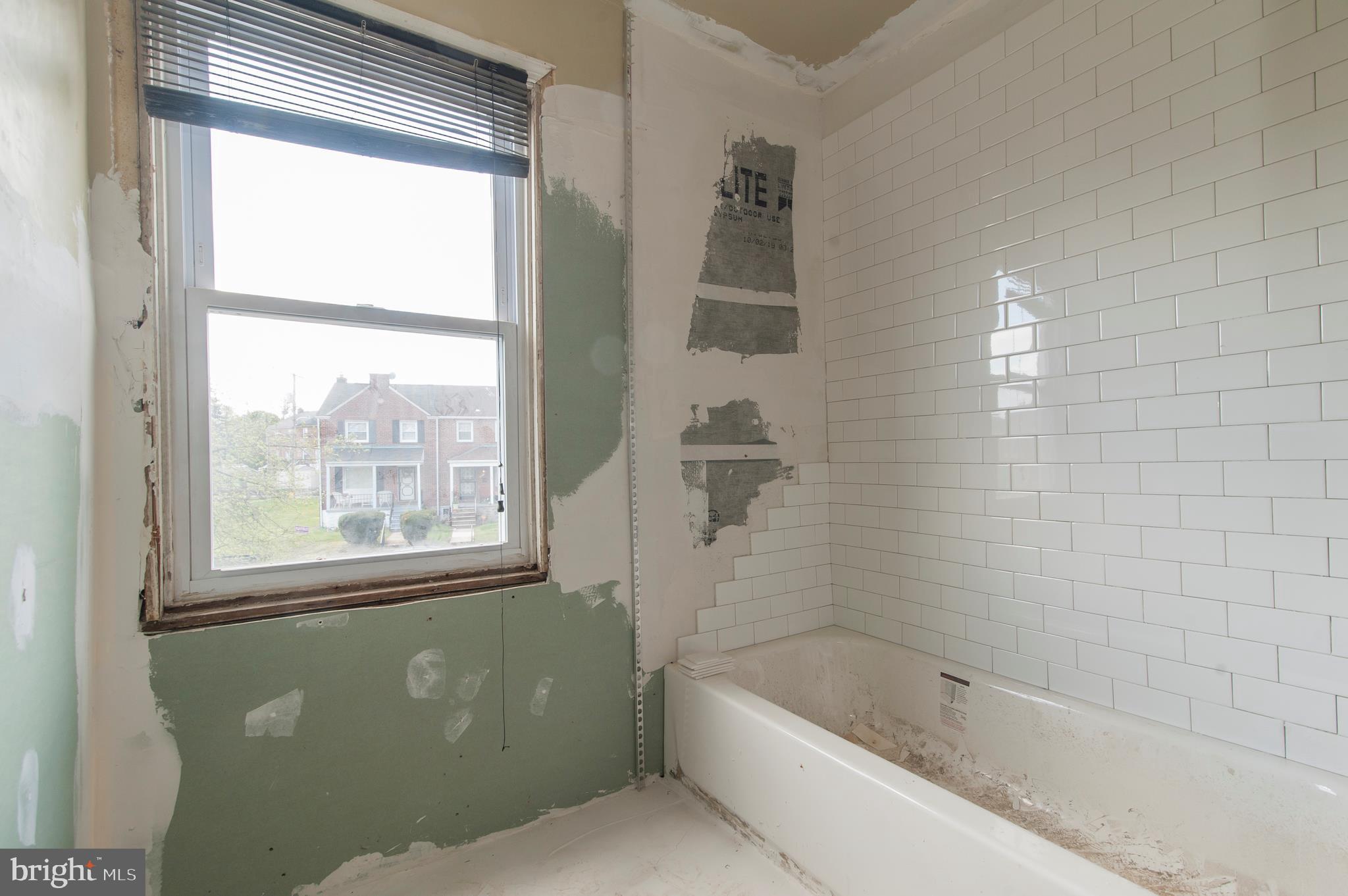 3819 Monterey Road Baltimore, MD 21218 - Photo 20 of 21 Tile tub surround