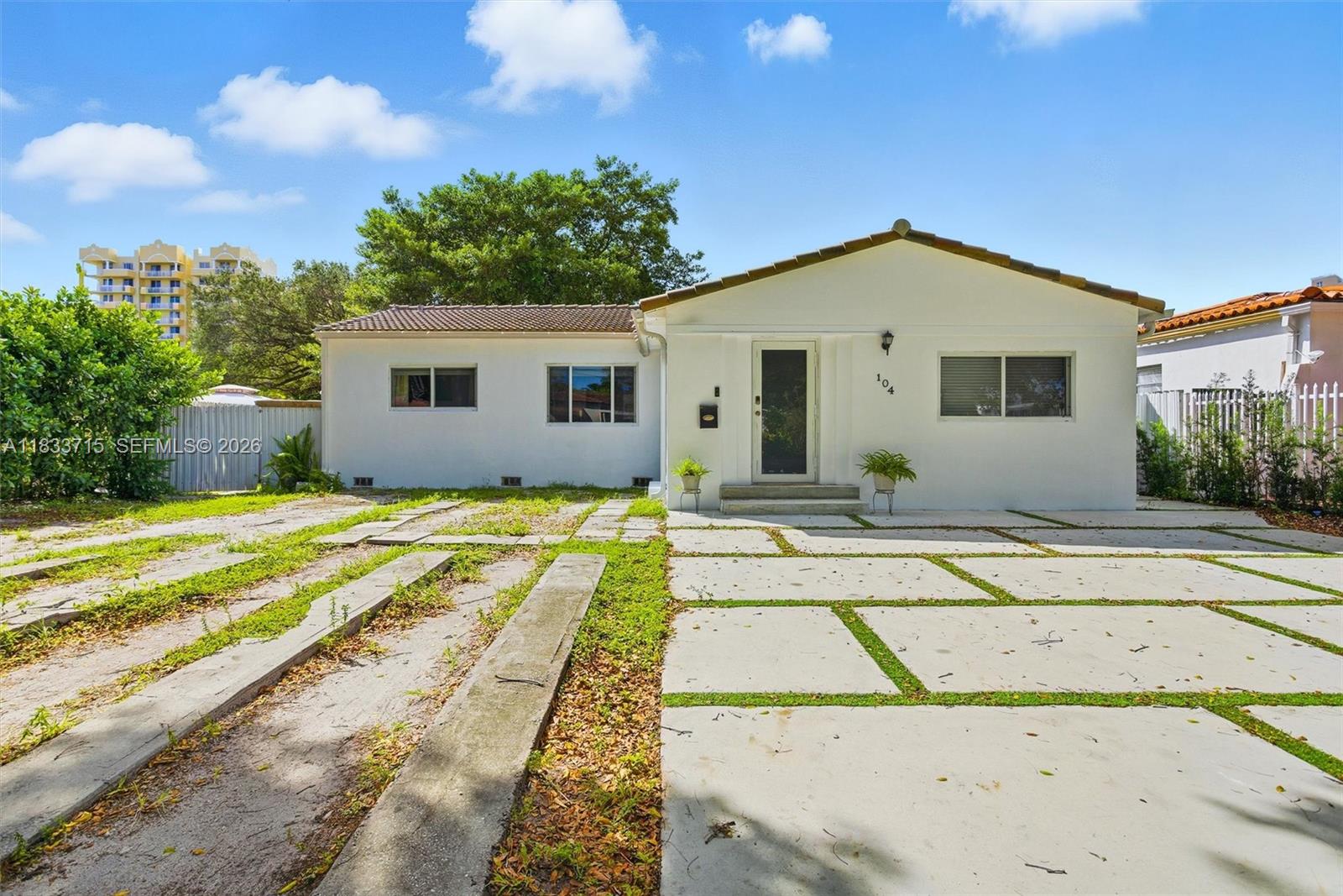 a view of backyard of a house