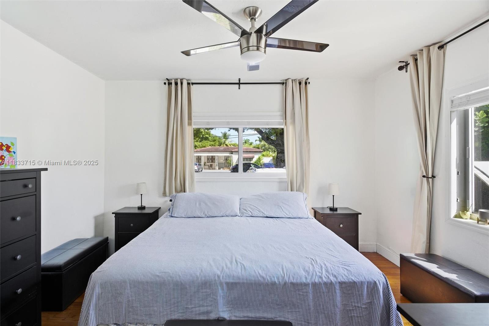 104 Southwest 40th Avenue Miami, FL 33134 - Photo 20 of 42 a bedroom with a bed and a window