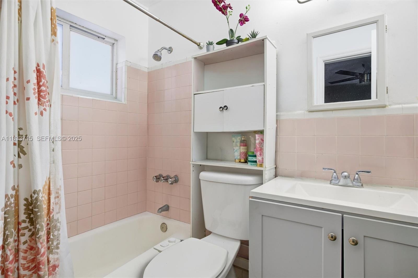 104 Southwest 40th Avenue Miami, FL 33134 - Photo 20 of 43 a bathroom with a sink toilet and shower