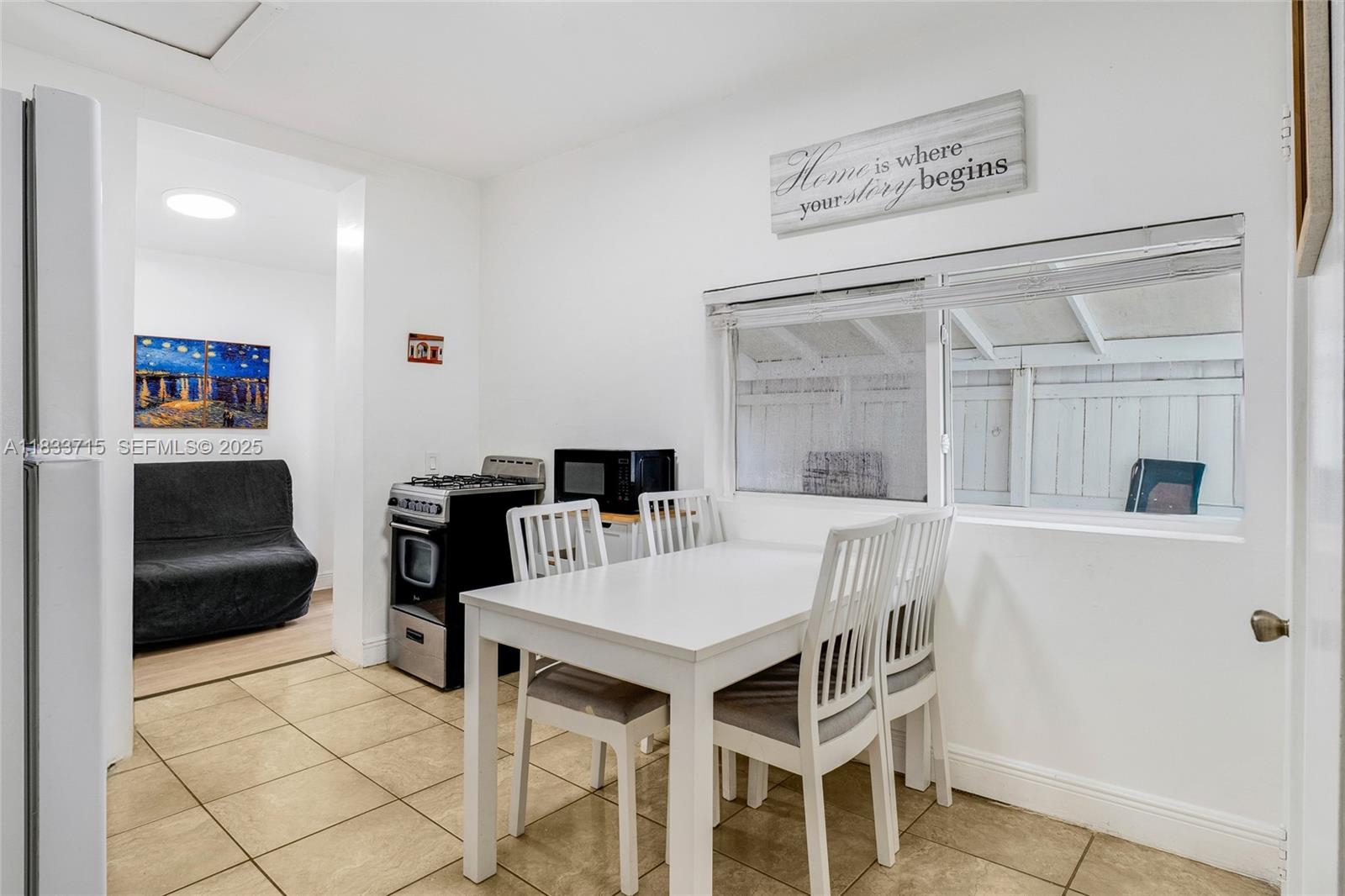 104 Southwest 40th Avenue Miami, FL 33134 - Photo 32 of 43 a view of a dining room with furniture