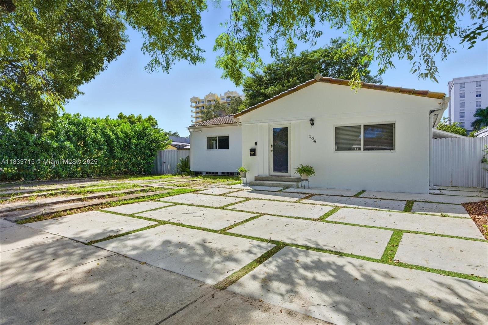 104 Southwest 40th Avenue Miami, FL 33134 - Photo 42 of 42 a view of a house with a backyard