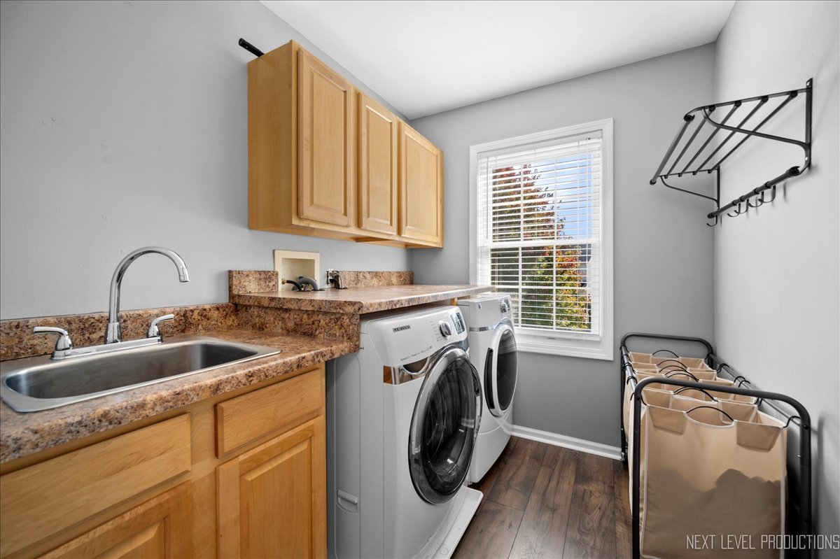 39W252 Bartelt Road Geneva, IL 60134 - Photo 20 of 34 a utility room with sink dryer and washer