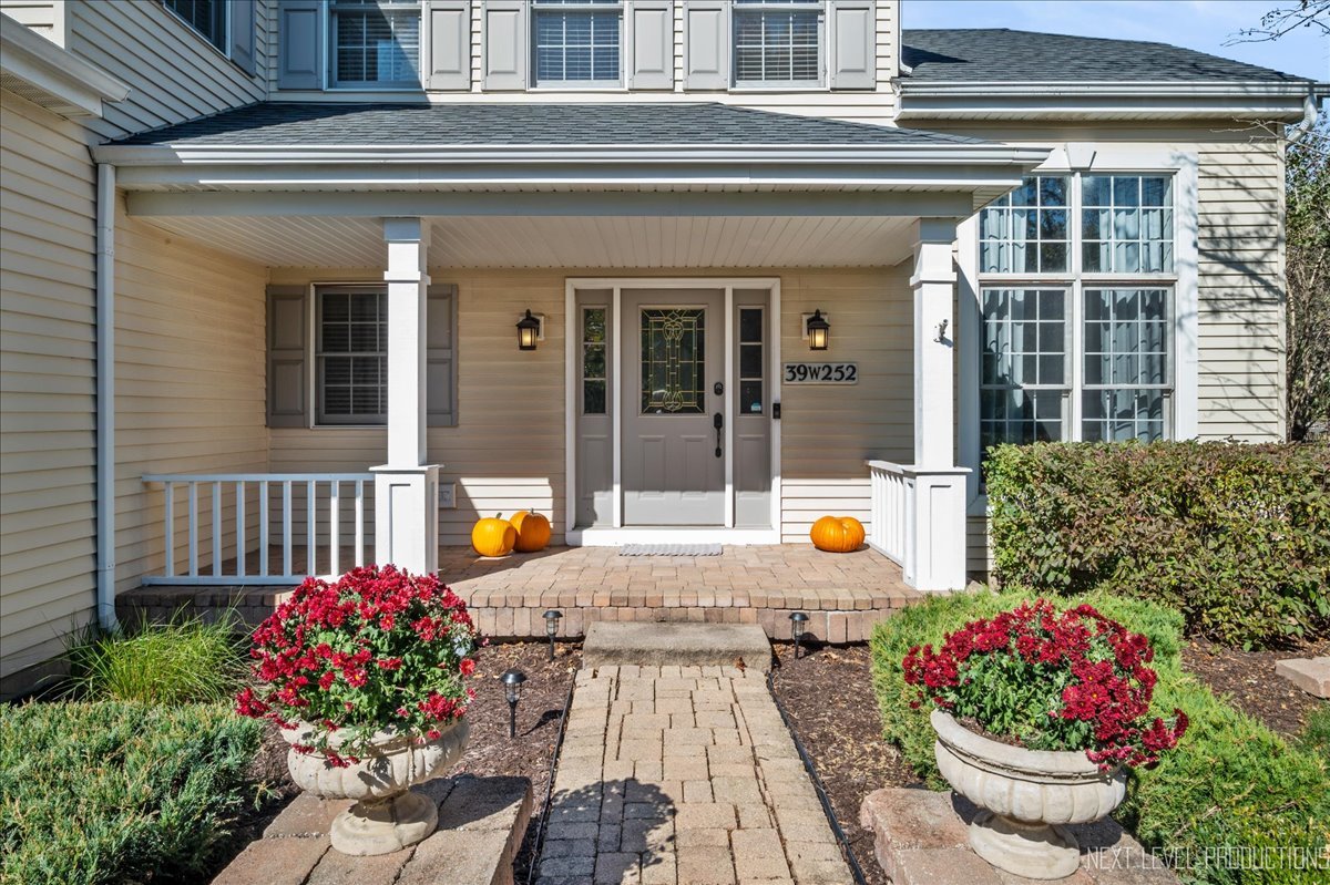 39W252 Bartelt Road Geneva, IL 60134 - Photo 2 of 34 a view of a house with outdoor seating