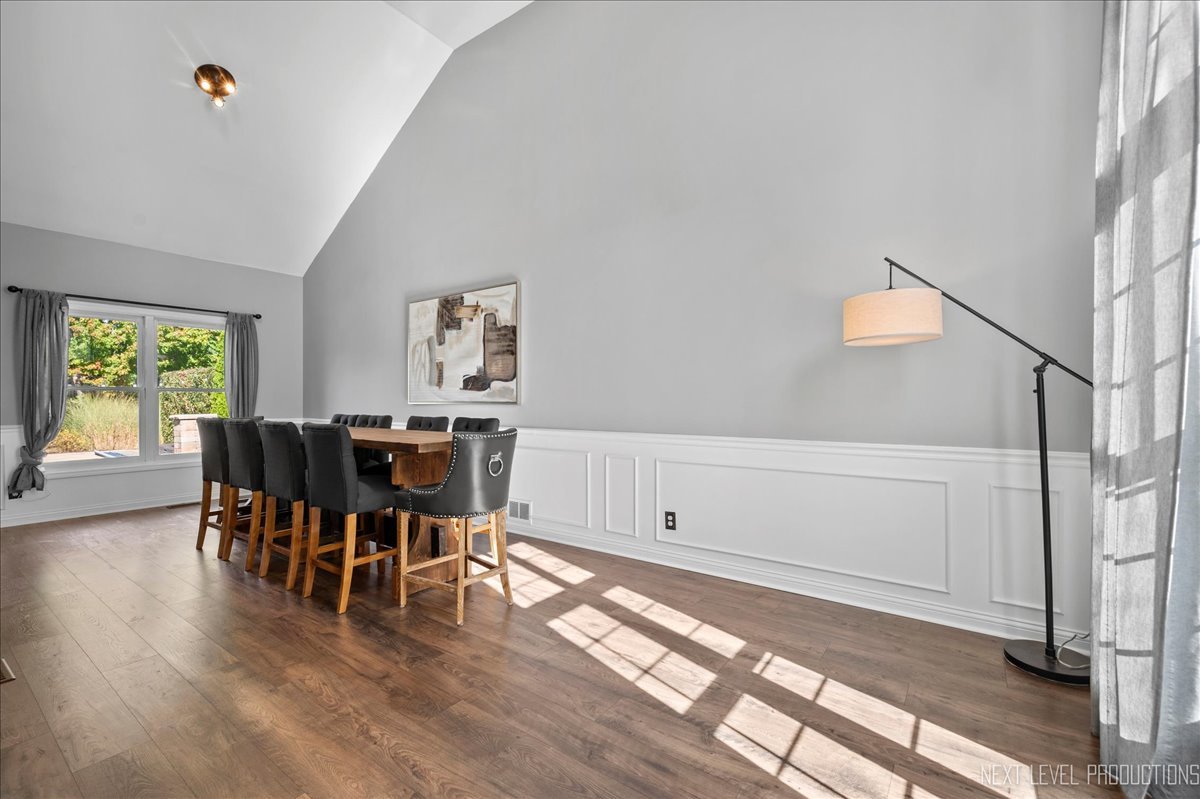 39W252 Bartelt Road Geneva, IL 60134 - Photo 5 of 34 a view of a dining room with furniture and wooden floor