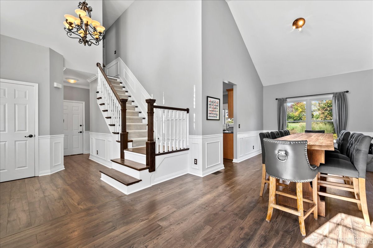 39W252 Bartelt Road Geneva, IL 60134 - Photo 6 of 34 a view of a livingroom with furniture wooden floor and windows