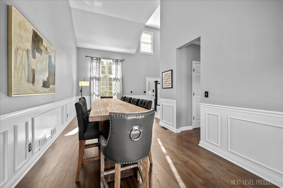 39W252 Bartelt Road Geneva, IL 60134 - Photo 7 of 34 a view of a dining room with furniture window and wooden floor
