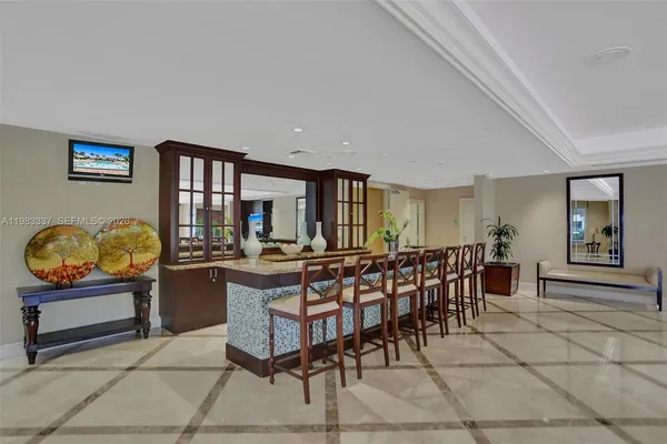 a room with furniture and gym equipment