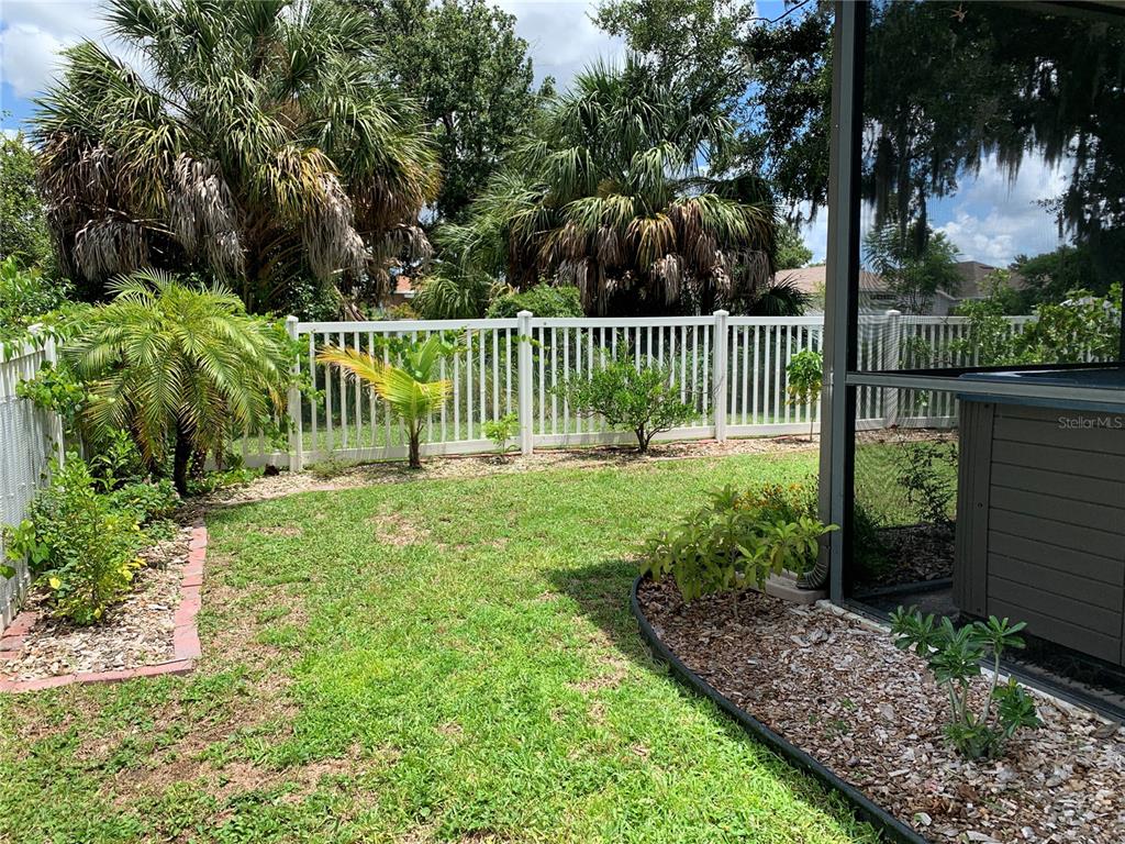 10308 Holland Road Riverview, FL 33578 - Photo 56 of 66 a view of a bench in the garden