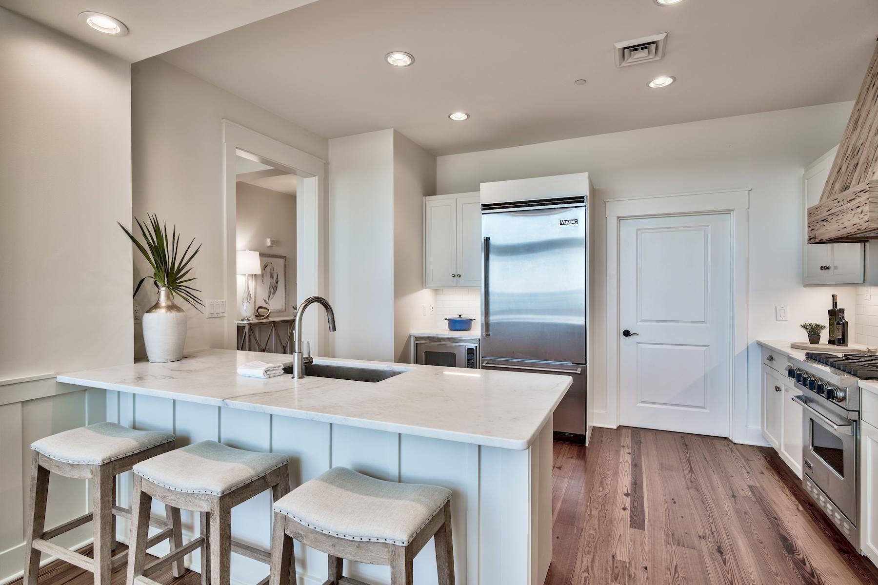 37 Compass Point Way South, Unit 424 Watersound, FL 32461 - Photo 5 of 26 a kitchen with a sink and cabinets