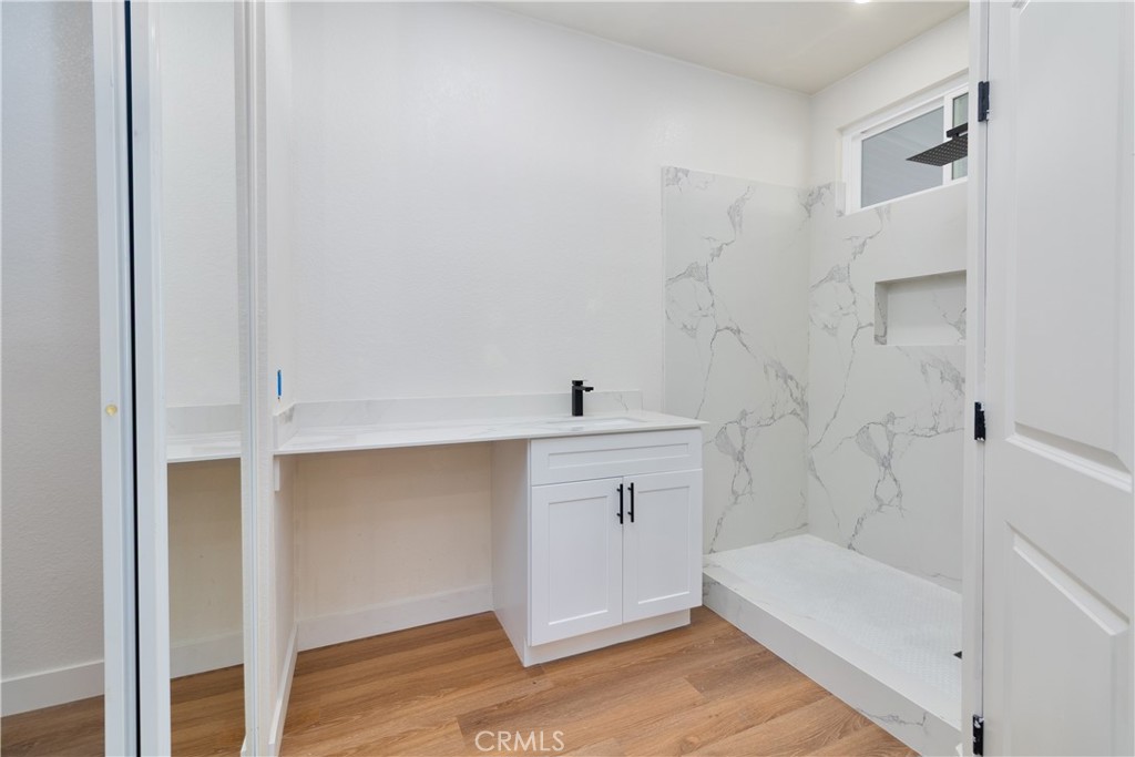 3397 North Poppy Drive Rialto, CA 92377 - Photo 25 of 31 MASTER BATHROOM WITH VANITY