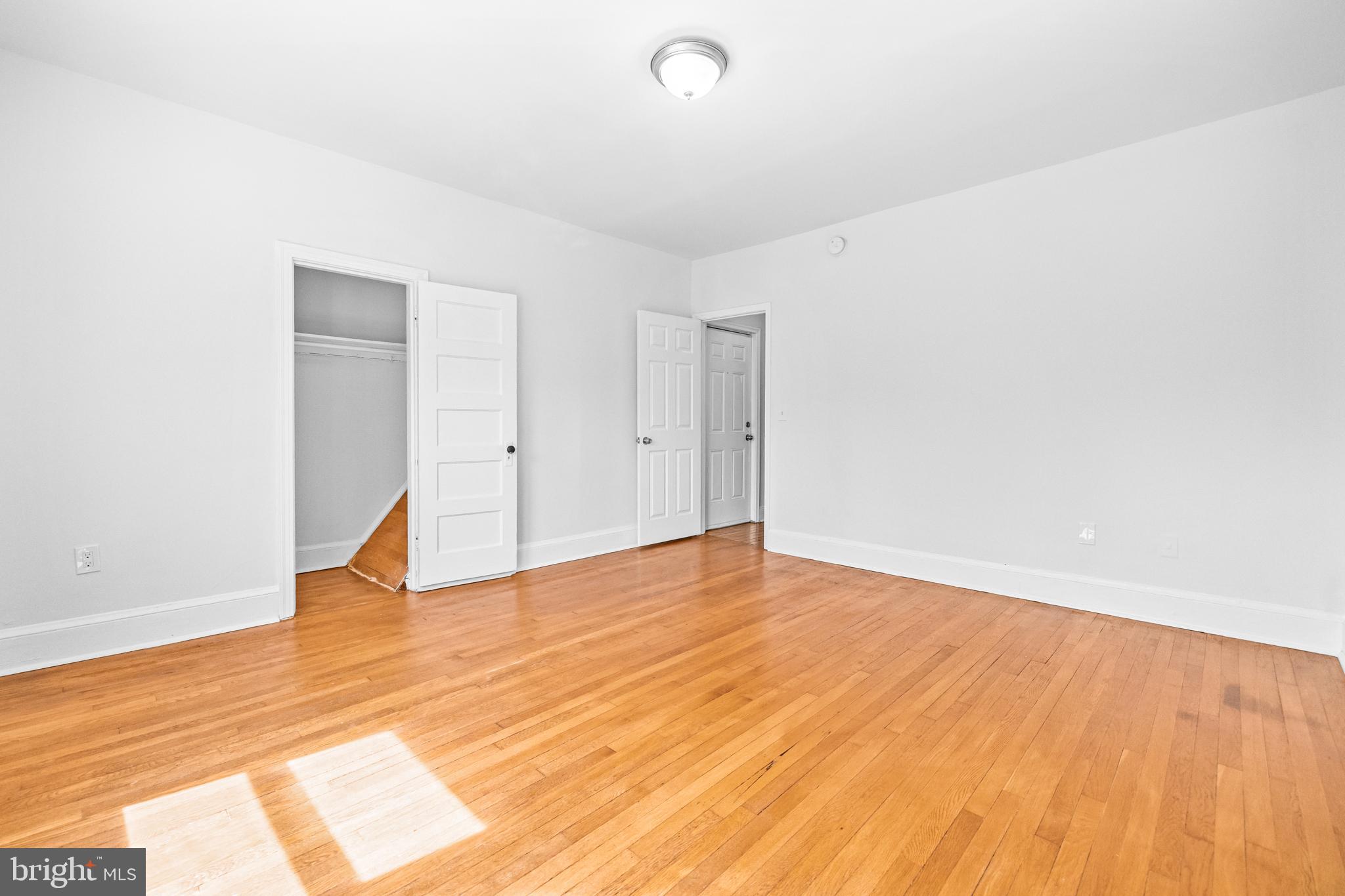 1508 V Street Southeast Washington, DC 20020 - Photo 33 of 41 a view of empty room with wooden floor and fan