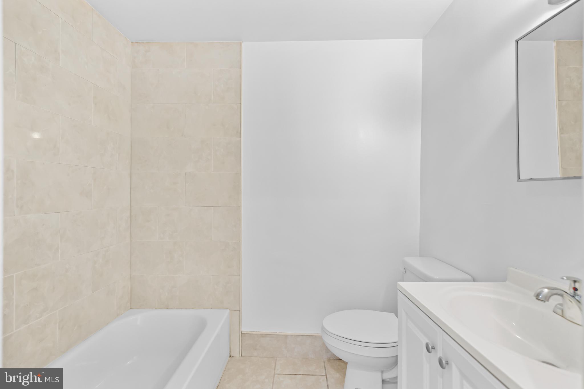 1508 V Street Southeast Washington, DC 20020 - Photo 7 of 41 a bathroom with a sink and a toilet