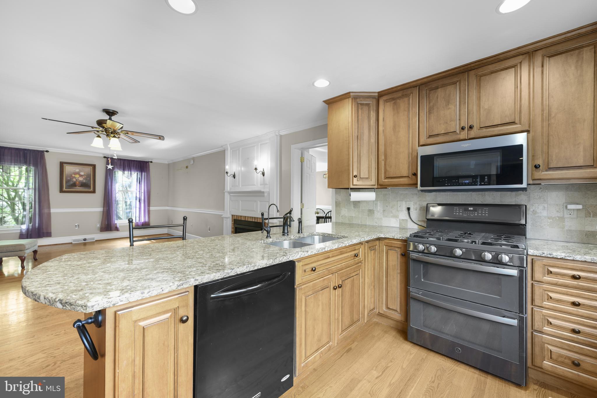 22 Fawn Drive Reading, PA 19607 - Photo 26 of 70 a kitchen with granite countertop a sink and cabinets