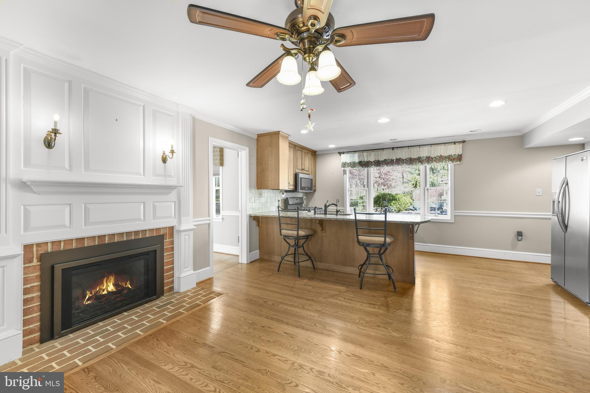 22 Fawn Drive Reading, PA 19607 - Photo 27 of 70 a view of a kitchen and dining room with a fireplace wooden floor