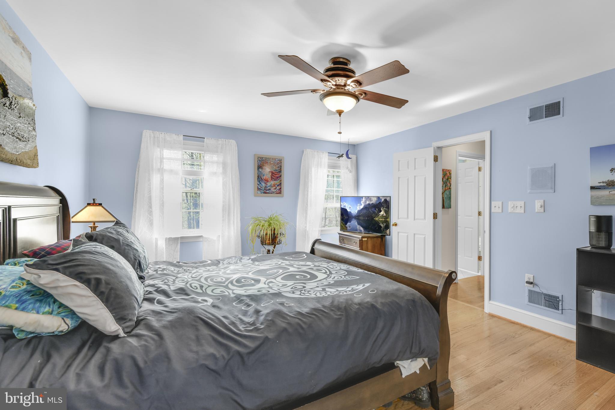 22 Fawn Drive Reading, PA 19607 - Photo 35 of 70 a bedroom with a bed and wooden floor