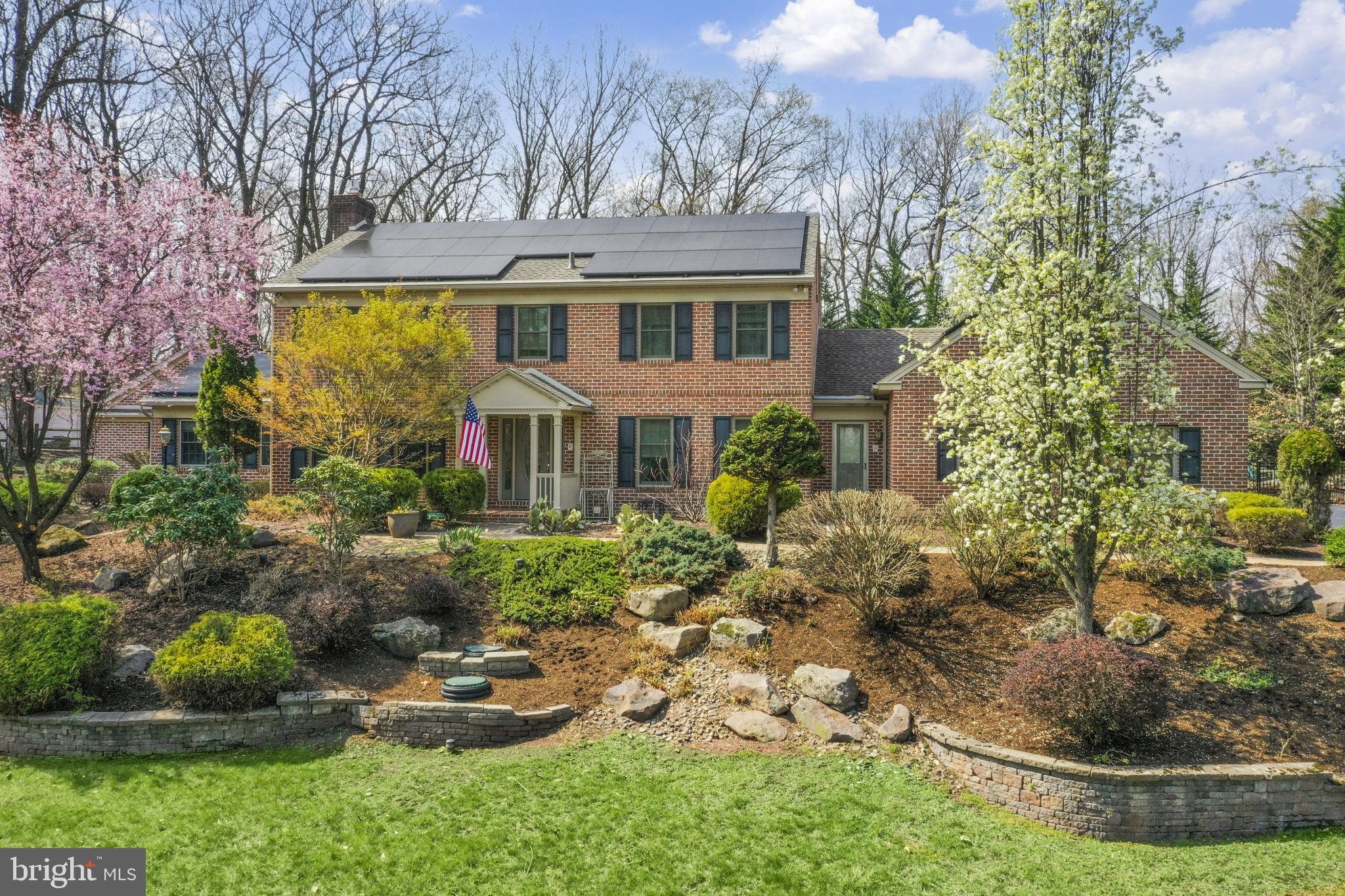 22 Fawn Drive Reading, PA 19607 - Photo 4 of 70 a front view of a house with a yard garage and outdoor seating