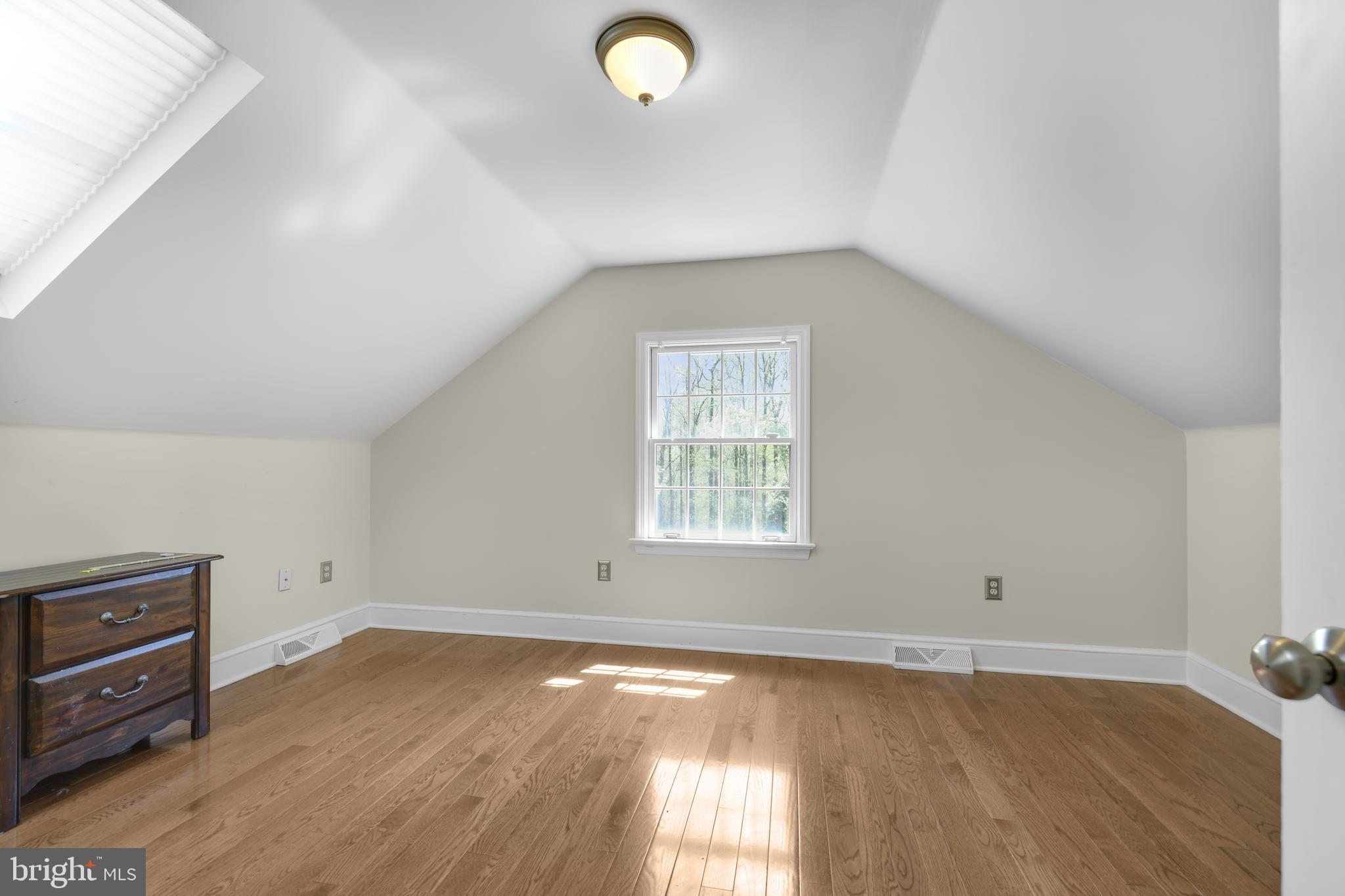 22 Fawn Drive Reading, PA 19607 - Photo 49 of 70 an empty room with wooden floor and windows
