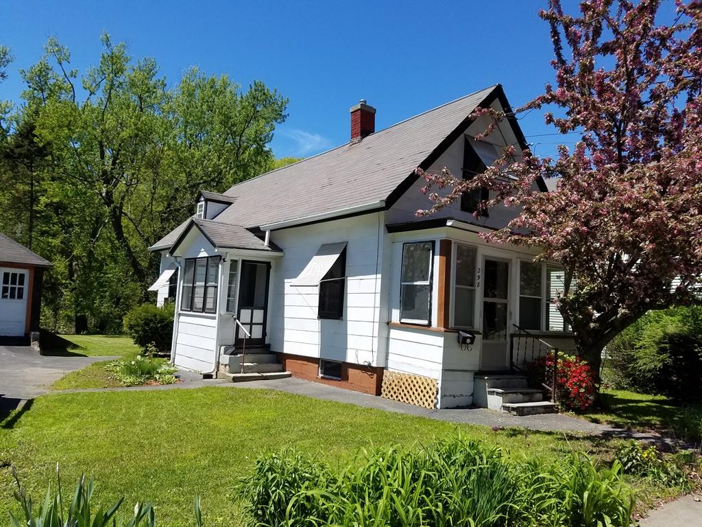 298 Deerfield Street Greenfield, MA 01301 - Photo 1 of 13 front view of a house with a yard