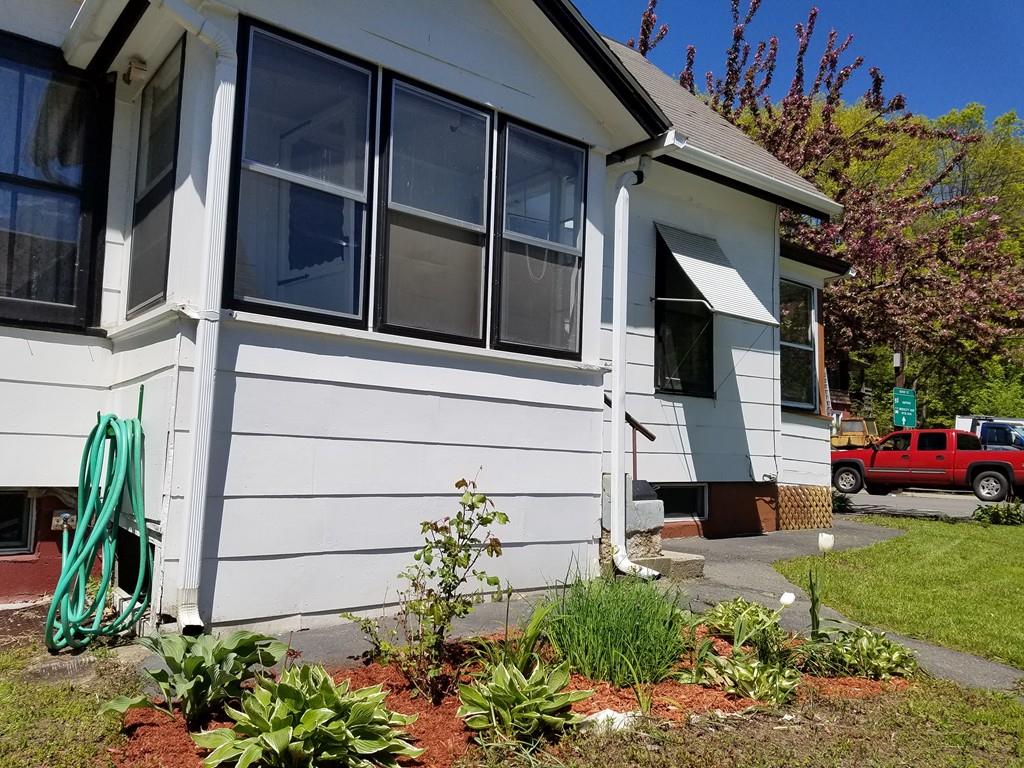 298 Deerfield Street Greenfield, MA 01301 - Photo 2 of 13 a view of a house with a garden