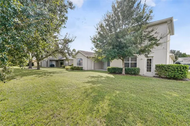 a view of a kitchen with a sink and cabinets