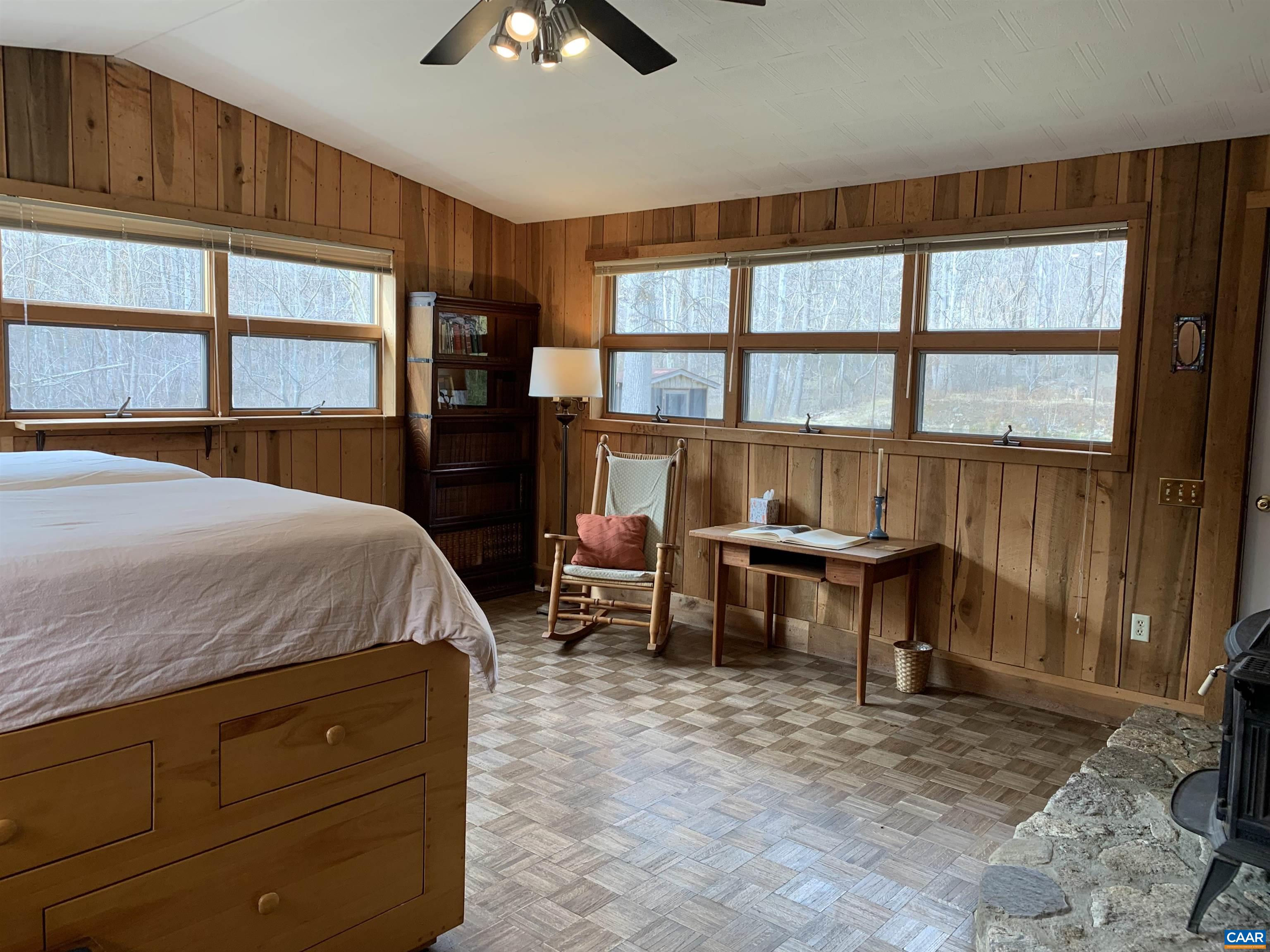 4873 Weakley Hollow Road Syria, VA 22743 - Photo 19 of 38 a bed room with a bed and a window