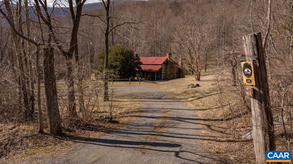 4873 Weakley Hollow Road Syria, VA 22743 - Photo 2 of 38 a building with trees in front of it