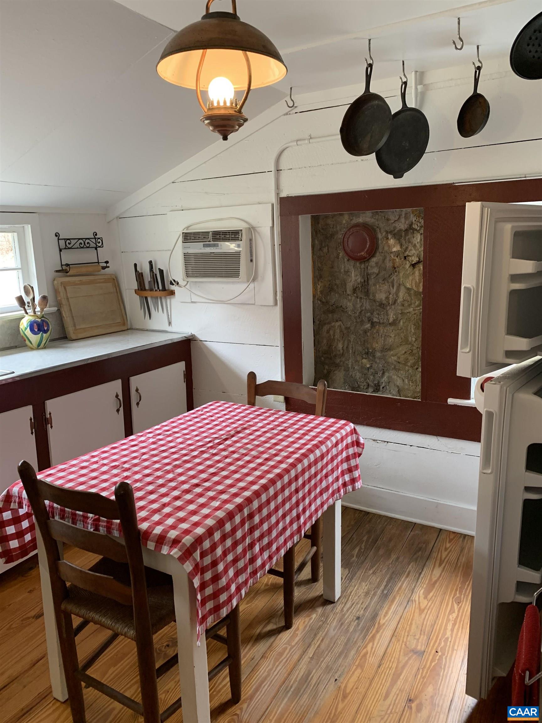 4873 Weakley Hollow Road Syria, VA 22743 - Photo 31 of 38 a dinning table and chairs in a room