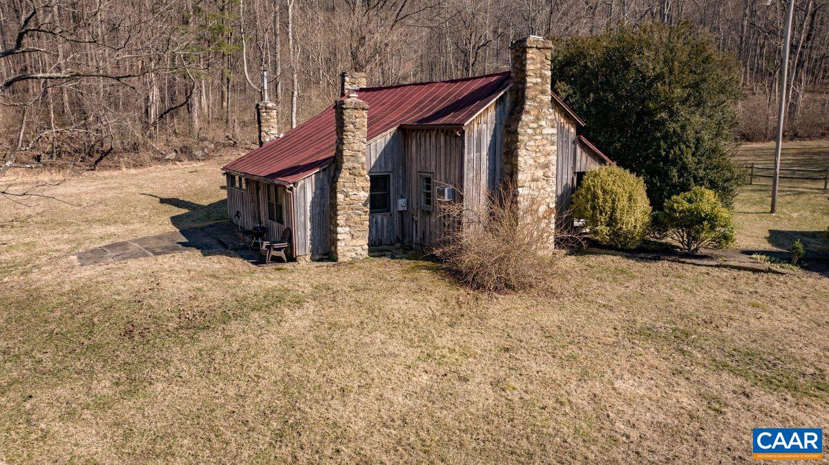 4873 Weakley Hollow Road Syria, VA 22743 - Photo 7 of 38 a view of a house with a yard