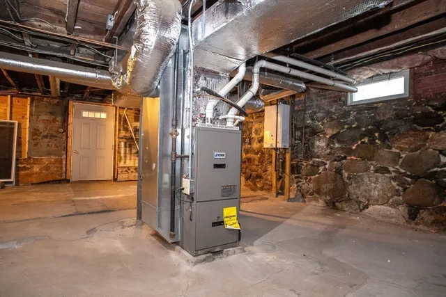 a view of a house with a yard and garage