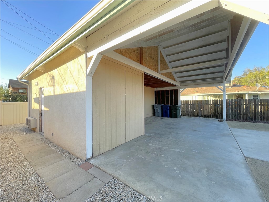 a view of backyard and tree
