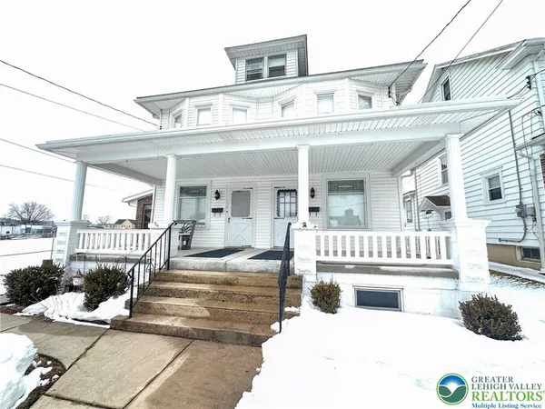 a view of a building with a porch