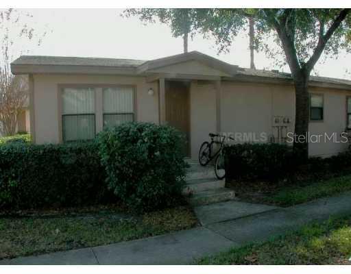 418 Eron Way Winter Garden, FL 34787 - Photo 1 of 1 a front view of a house with garden