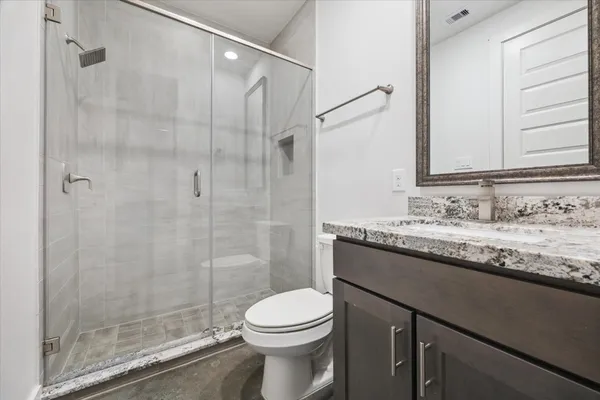 a view of a hallway with staircase