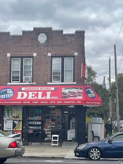 a cafe on the corner of a building
