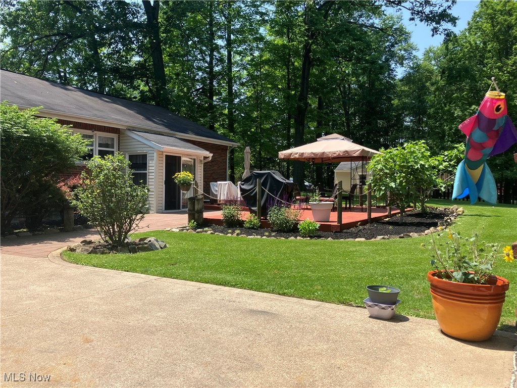 19005 Alexander Road Walton Hills, OH 44146 - Photo 6 of 15 View of yard with a wooden deck